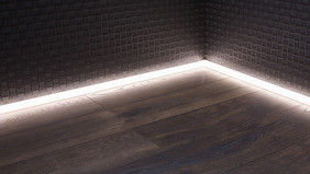Mit dem stufenlos dimmbaren LED-Kanal Luxline lassen sich unterschiedliche Raumstimmungen erzeugen.